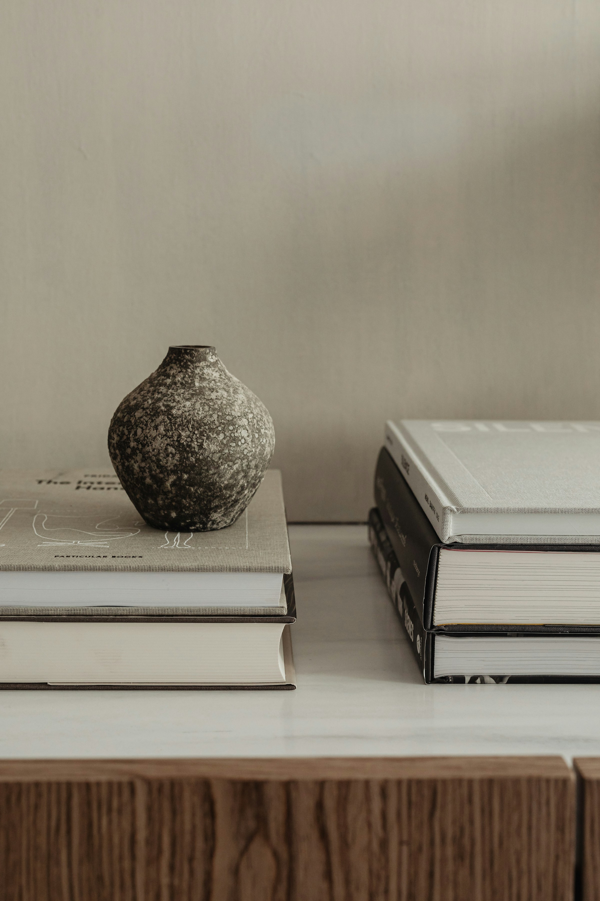 Detail: wood side table and textured throw