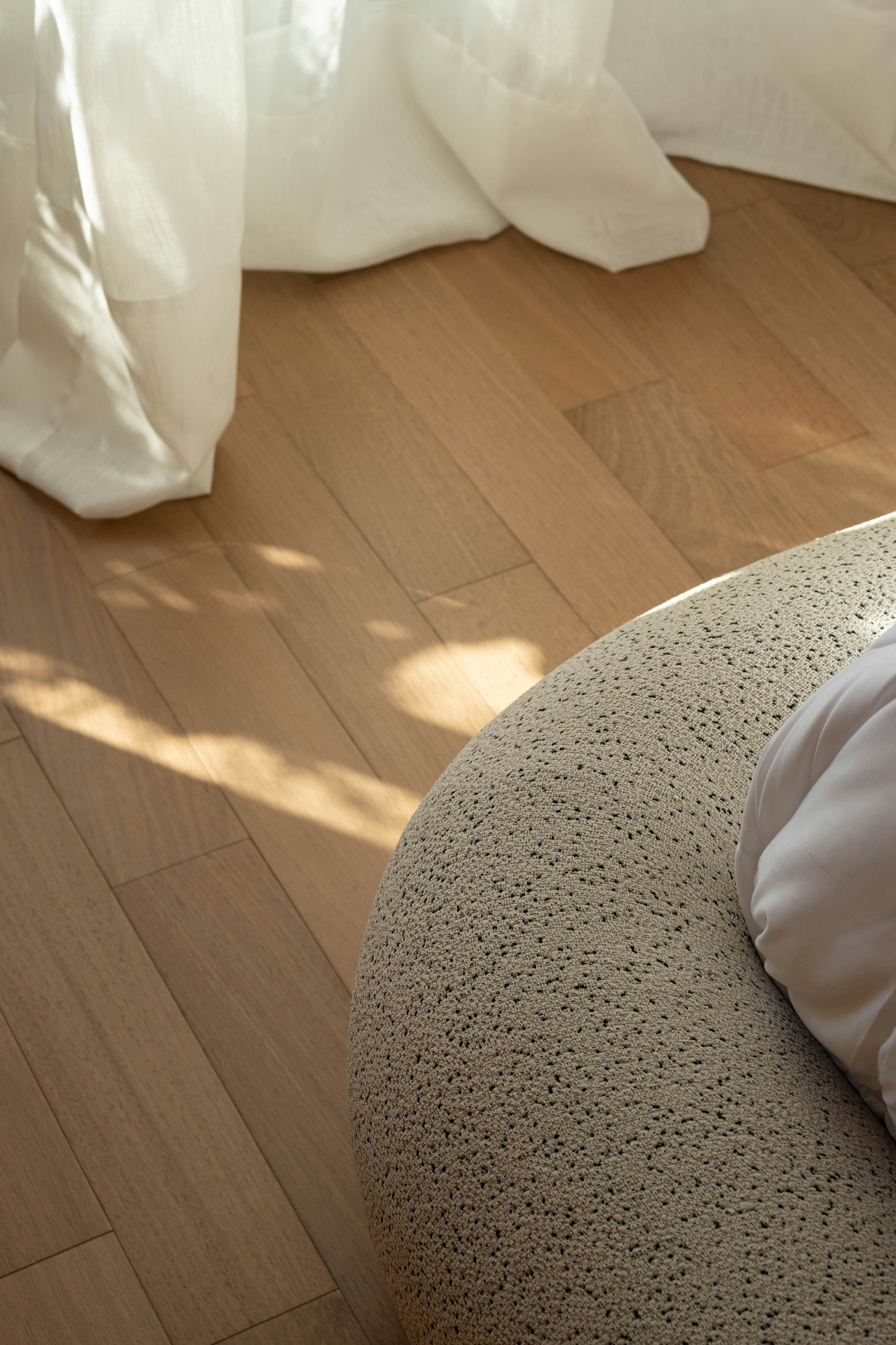 Detail: performance fabric or rounded ottoman
