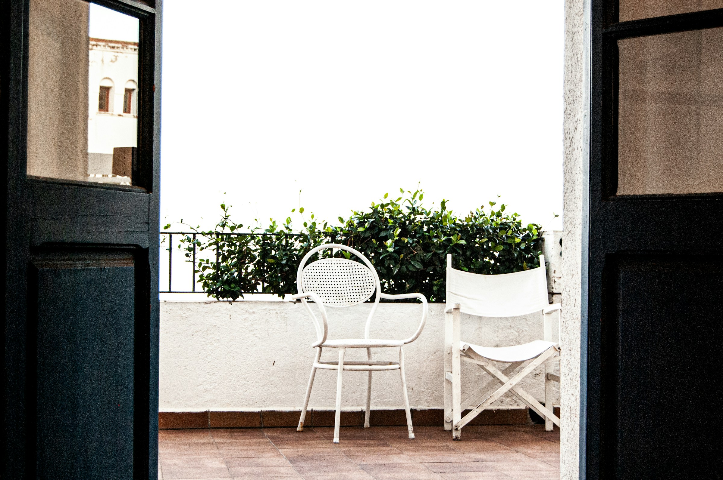 Detail: outdoor dining table on a deck or balcony